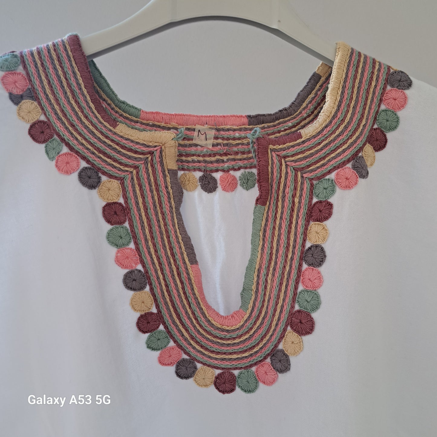 Blusa cadenilla bolitas