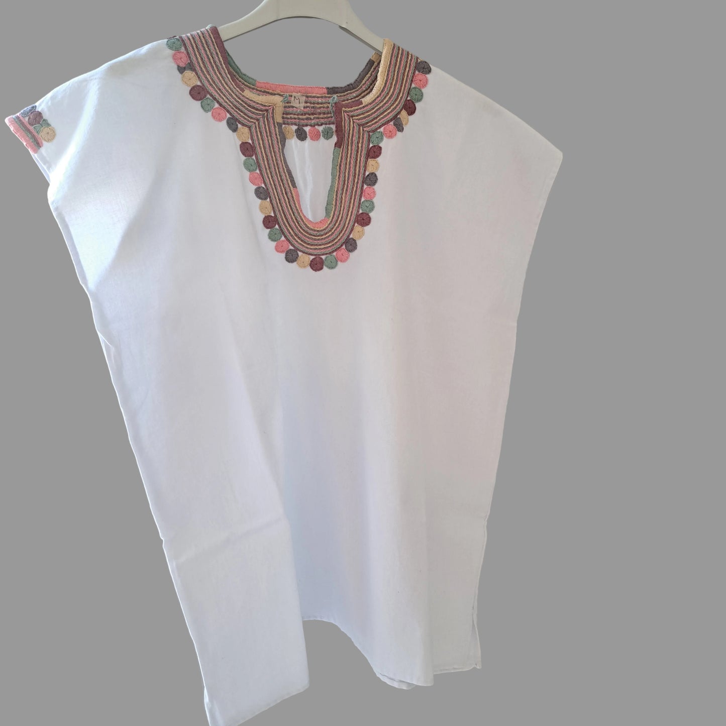 Blusa cadenilla bolitas