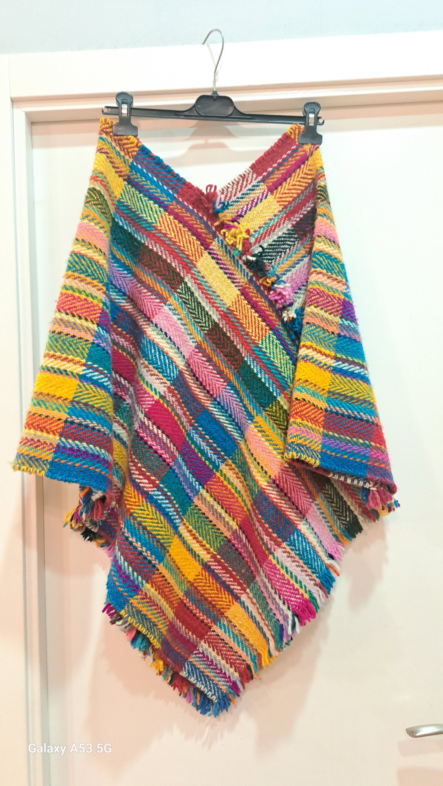 Capa-poncho de lana natural